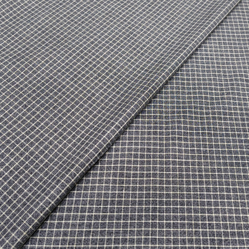 (U)58% Wool, 40% Polyester, 2% Lycra